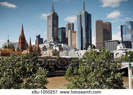 Skyline von Melbourne mit Flinders Street Station und den Kirchtuermen der St Paul's Cathedral, Victoria, Australien, Melbourne Skyline with Flinders Street Station and the towers of St Paul's Cathedral, Victoria, Australia View Large Photo Image Stock Photo - Skyline von Melbourne mit Flinders Street Station und den Kirchtuermen der St Paul's Cathedral, Victoria, Australien, Melbourne Skyline with Flinders Street Station and the towers of St Paul's Cathedral, Victoria, Australia. Fotosearch