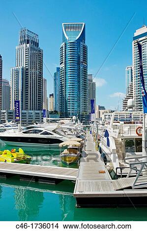 Skyscrapers and Marina in Dubai Marina area, Dubai City, Dubai, United Arab Emirates, Middle East. View Large Photo Image Picture - Skyscrapers and Marina in Dubai Marina area, Dubai City, Dubai, United Arab Emirates, Middle East.. Fotosearch
