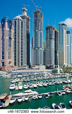 Skyscrapers and Marina in Dubai Marina area, Dubai City, Dubai, United Arab Emirates, Middle East. View Large Photo Image Stock Image - Skyscrapers and Marina in Dubai Marina area, Dubai City, Dubai, United Arab Emirates, Middle East.. Fotosearch
