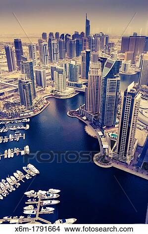 Skyscrapers and yachts in Dubai Marina Dubai city Dubai United Arab Emirates View Large Photo Image Picture - Skyscrapers and yachts in Dubai Marina Dubai city Dubai United Arab Emirates. Fotosearch
