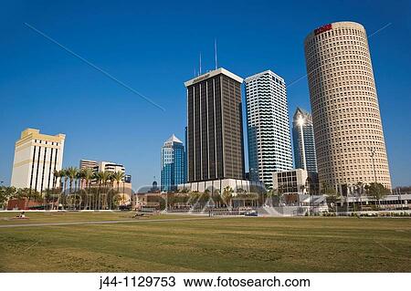 Stock Image - Skyscrapers at downtown Tampa seen from Curtis Hixon Waterfront Park. Fotosearch