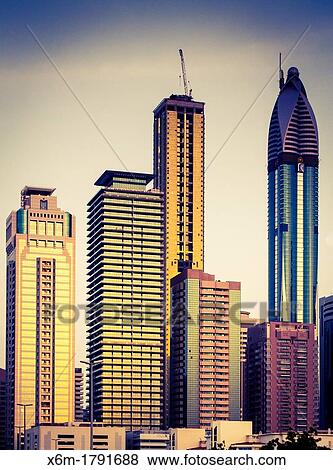 Skyscrapers in city center Jumeirah area Dubai city Dubai United Arab Emirates View Large Photo Image Stock Photo - Skyscrapers in city center Jumeirah area Dubai city Dubai United Arab Emirates. Fotosearch