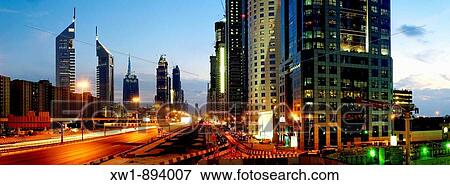 Skyscrapers, multistory buildings along Sheikh Zayed Road, Al Satwa, Emirate Dubai, United Arab Emirates, UAE, Arabia, Middle East, West Asia View Large Photo Image Stock Photo - Skyscrapers, multistory buildings along Sheikh Zayed Road, Al Satwa, Emirate Dubai, United Arab Emirates, UAE, Arabia, Middle East, West Asia. Fotosearch