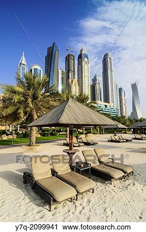 Skyscrapers of Dubai Marina tower above The Westin Dubai Mina Seyahi Beach Resort Hotel, Dubai, UAE. View Large Photo Image Stock Image - Skyscrapers of Dubai Marina tower above The Westin Dubai Mina Seyahi Beach Resort Hotel, Dubai, UAE.. Fotosearch