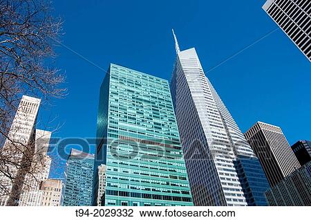 Skyscrapers surrounding Bryant Park in Midtown Manhattan, New York City. View Large Photo Image Stock Image - Skyscrapers surrounding Bryant Park in Midtown Manhattan, New York City.. Fotosearch