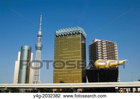 Stock Image - Skytree Tower, On Sumida River, Tokyo, Near Asakusa Kannon Temple, Sensoji Temple, Modern architecture Japan, River cruises Tokyo, Horizontal.. Fotosearch