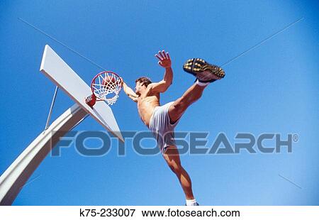 Slam dunk basketball View Large Photo Image Stock Photo - Slam dunk basketball. Fotosearch