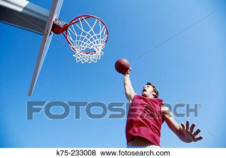 Stock Photo - Slam dunk. Fotosearch