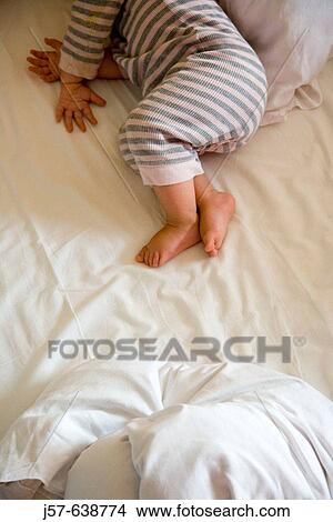 Sleeping 16 month old baby girl detail. View Large Photo Image Picture - Sleeping 16 month old baby girl detail.. Fotosearch