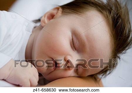 Sleeping baby View Large Photo Image Stock Image - Sleeping baby. Fotosearch