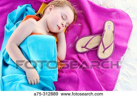 sleeping child on the beach View Large Photo Image Stock Photo - sleeping child on the beach. Fotosearch
