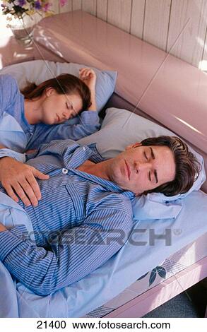 Sleeping couple View Large Photo Image Stock Image - Sleeping couple. Fotosearch