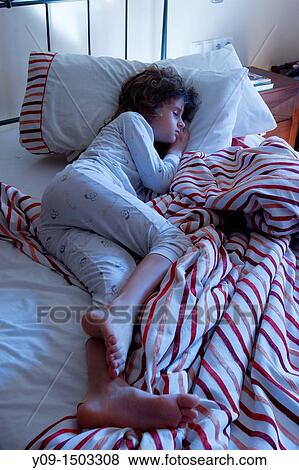 Sleeping girl in the fathers bed View Large Photo Image Stock Photo - Sleeping girl in the fathers bed. Fotosearch