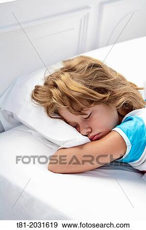 Sleeping girl, white sheets, face down, Ribadesella, Spain View Large Photo Image Stock Photo - Sleeping girl, white sheets, face down, Ribadesella, Spain. Fotosearch