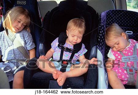 Sleeping in car seats View Large Photo Image Stock Image - Sleeping in car seats. Fotosearch