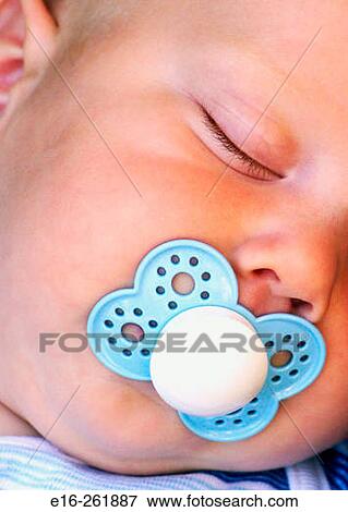 Sleeping infant View Large Photo Image Stock Photo - Sleeping infant. Fotosearch