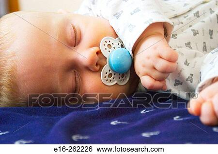 Sleeping infant View Large Photo Image Stock Photograph - Sleeping infant. Fotosearch