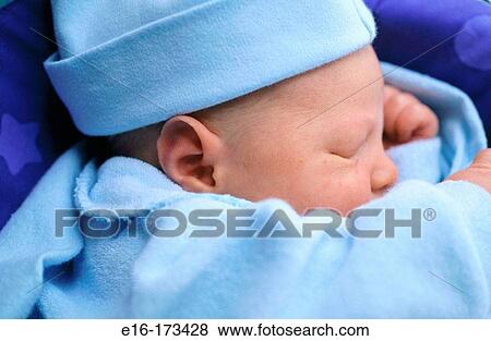 Sleeping newborn View Large Photo Image Stock Photo - Sleeping newborn. Fotosearch