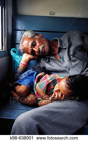 Sleeping on a train. Bundi. Cordillera Vindhya. Rajastan. India. View Large Photo Image Stock Image - Sleeping on a train. Bundi. Cordillera Vindhya. Rajastan. India.. Fotosearch