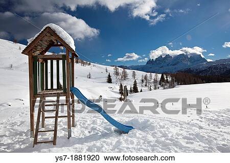 Stock Image - Slipway in the the snow playground at Fuciade hut, San Pellegrino mountain pass, Trentino Alto Adige, Italy, Europe. Fotosearch