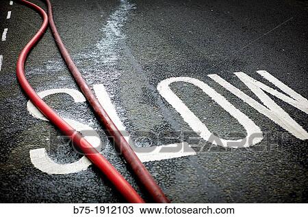 Slow, firefighter hoses on asphalt of the city of London, England, UK View Large Photo Image Stock Image - Slow, firefighter hoses on asphalt of the city of London, England, UK. Fotosearch