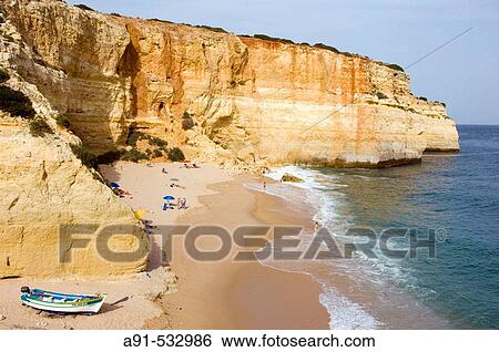 Small beach and fishermen harbour on the coast near Albufeira. Algarve. Portugal View Large Photo Image Stock Photograph - Small beach and fishermen harbour on the coast near Albufeira. Algarve. Portugal. Fotosearch