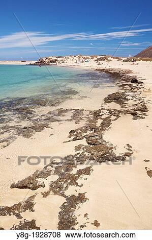 Stock Photo - Small beach on the Lobos Island, Canary Islands, Spain. Fotosearch