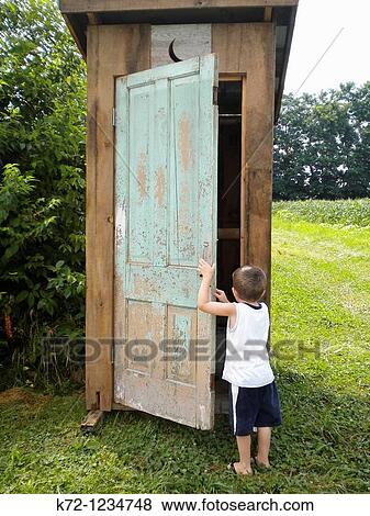 Small Boy Going Into Outhouse View Large Photo Image Stock Photo - Small Boy Going Into Outhouse. Fotosearch