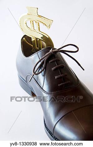 Small business standing in bigger shoes View Large Photo Image Stock Photo - Small business standing in bigger shoes. Fotosearch