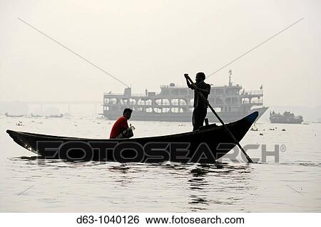 Small ferry boats on the Buriganga River, Dahka, Bangladesh View Large Photo Image Stock Photograph - Small ferry boats on the Buriganga River, Dahka, Bangladesh. Fotosearch