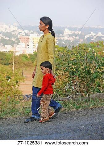 Small girl with her mother View Large Photo Image Stock Image - Small girl with her mother. Fotosearch