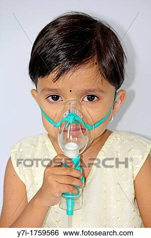 Stock Photograph - Small Girl with Mask. Fotosearch