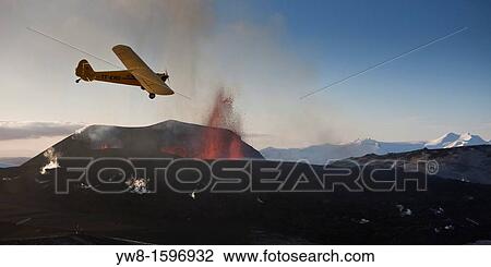 Small plane flying over Eyjafjallajokull Eruption, Iceland 2010 View Large Photo Image Stock Image - Small plane flying over Eyjafjallajokull Eruption, Iceland 2010. Fotosearch