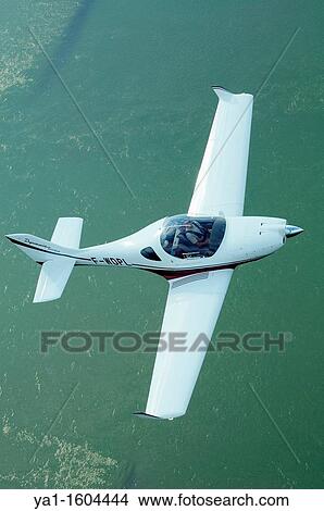 Small sport European LSA Aerospool Dynamic Turbo plane flying over Rhein river, Alsace, France View Large Photo Image Picture - Small sport European LSA Aerospool Dynamic Turbo plane flying over Rhein river, Alsace, France. Fotosearch