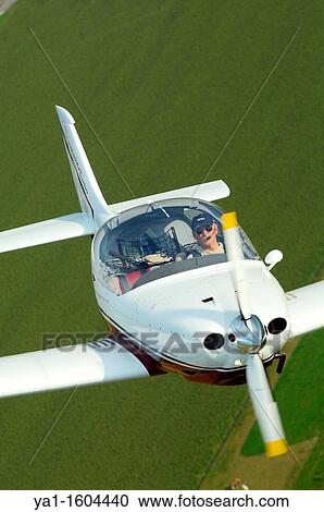 Small sport European LSA Aerospool Dynamic Turbo plane flying over France View Large Photo Image Stock Image - Small sport European LSA Aerospool Dynamic Turbo plane flying over France. Fotosearch