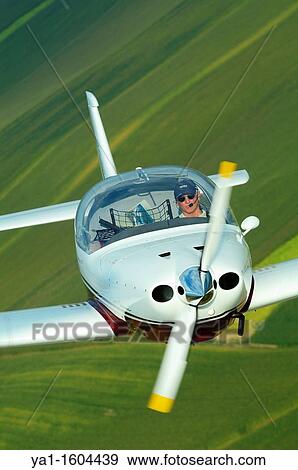 Small sport European LSA Aerospool Dynamic Turbo plane flying over France View Large Photo Image Stock Photo - Small sport European LSA Aerospool Dynamic Turbo plane flying over France. Fotosearch