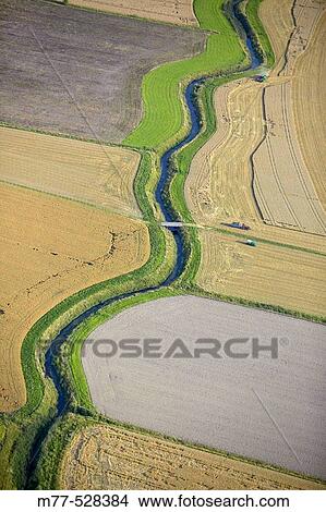 Small stream in agricultural landscape, autumn, aerial view. N? rke, Sweden View Large Photo Image Picture - Small stream in agricultural landscape, autumn, aerial view. N? rke, Sweden. Fotosearch