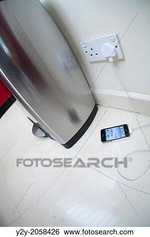 Smartphone and bin. View Large Photo Image Stock Photograph - Smartphone and bin.. Fotosearch