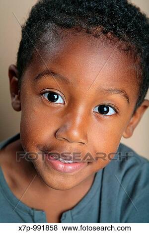 Smiling African American boy View Large Photo Image Stock Photo - Smiling African American boy. Fotosearch