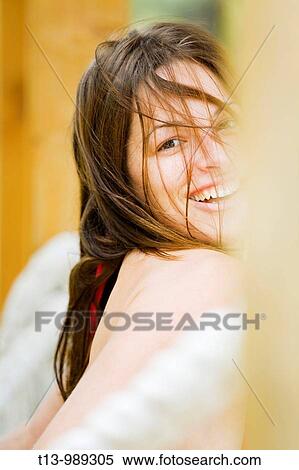 Smiling attractive young woman portrait with untidy hair View Large Photo Image Stock Photography - Smiling attractive young woman portrait with untidy hair. Fotosearch