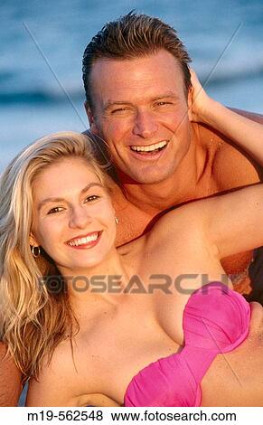 smiling beach couple View Large Photo Image Stock Photo - smiling beach couple. Fotosearch