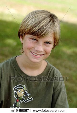Smiling blond boy View Large Photo Image Stock Image - Smiling blond boy. Fotosearch