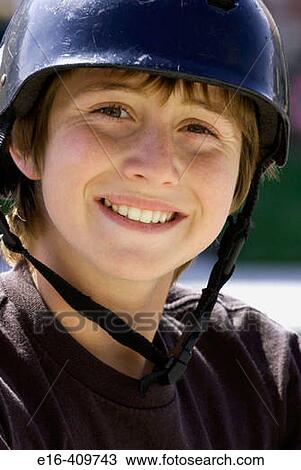 Smiling boy wearing bike helmet. View Large Photo Image Stock Image - Smiling boy wearing bike helmet.. Fotosearch