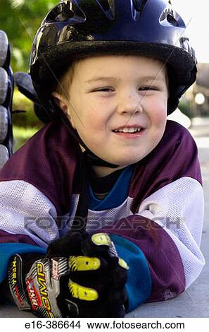 smiling boy with helmet on View Large Photo Image Picture - smiling boy with helmet on. Fotosearch