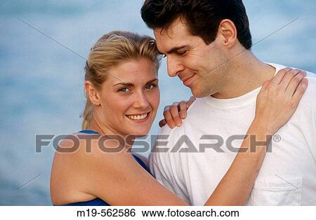 Stock Photograph - smiling couple. Fotosearch