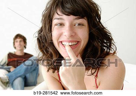 Smiling girl and boy in background View Large Photo Image Stock Image - Smiling girl and boy in background. Fotosearch