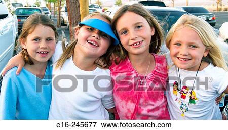 Stock Photo - smiling girl friends. Fotosearch