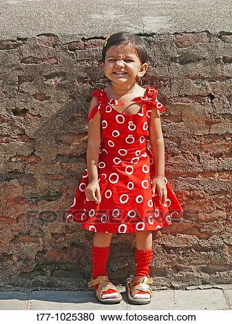 Smiling girl in Red Dress View Large Photo Image Stock Image - Smiling girl in Red Dress. Fotosearch