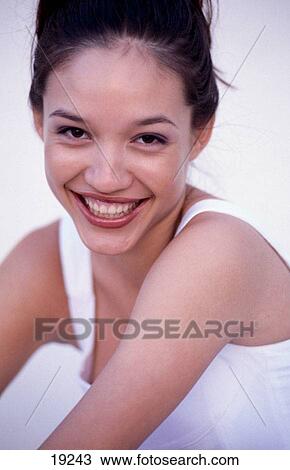 Stock Image - Smiling girl. Fotosearch