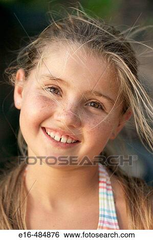 Stock Photograph - Smiling girl. Fotosearch